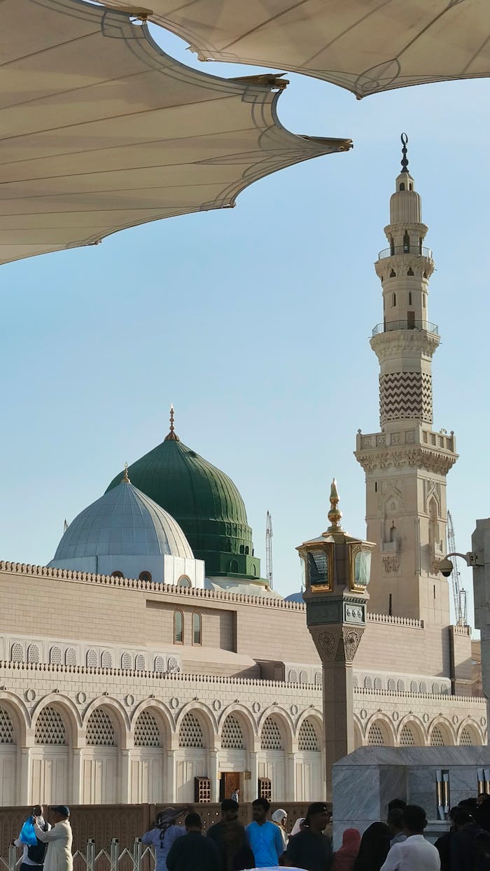 Beautiful image of the Prophets Mosque in Medina showcasing its iconic dome and minaret.